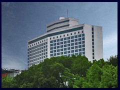 White Swan Hotel, the only highrise building on Shamian Island.It has a waterfall inside the lobby. It has 34 floors and was built in 1980, at the moment the second tallest building in Guangzhou.